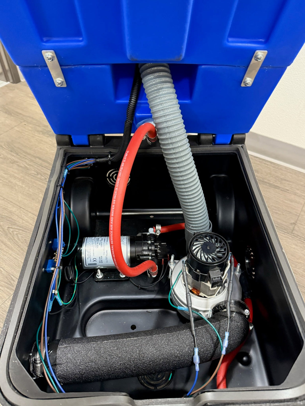 US Products Cobra extractor showing the vac motor, heater and solution pump.
